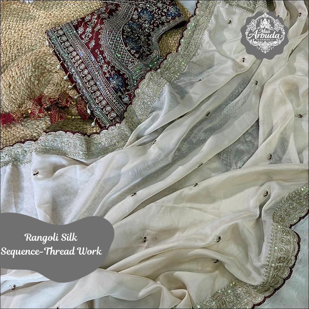 Rangoli Silk Saree with Embroidered Border and Stitched Blouse!