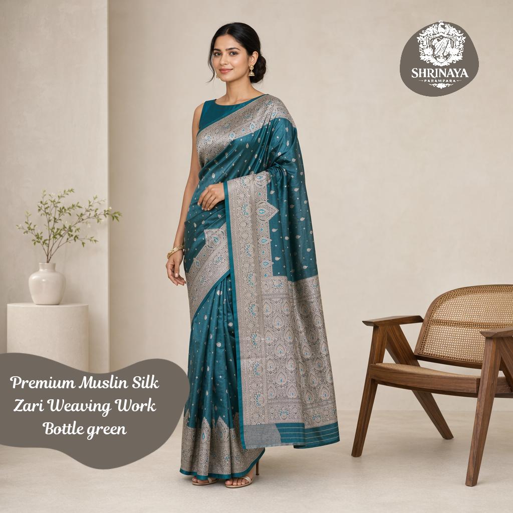Bottle Green Muslin Silk Saree with Zari Embroidery on Pallu and Border