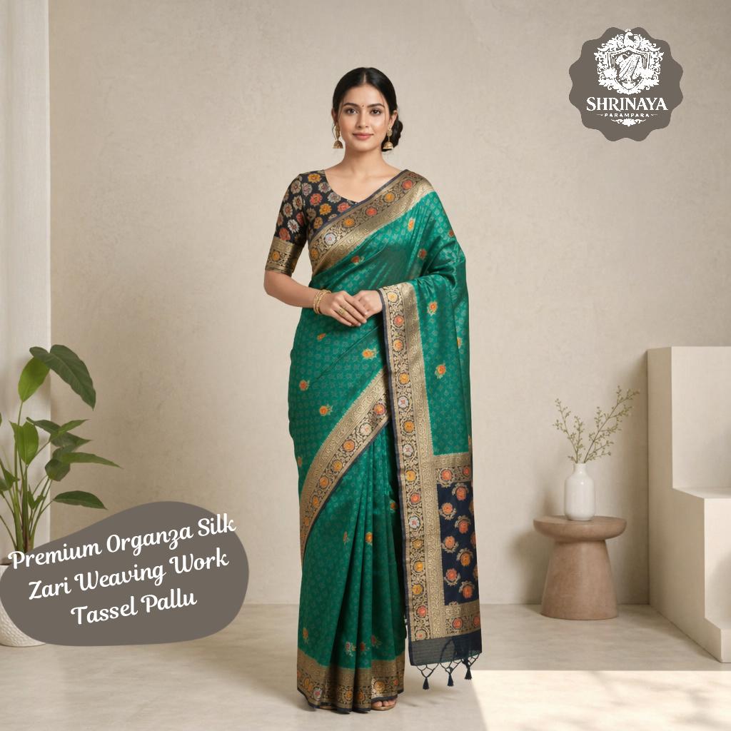 Bottle Green Organza Silk Saree with Zari Work and Tassel Pallu