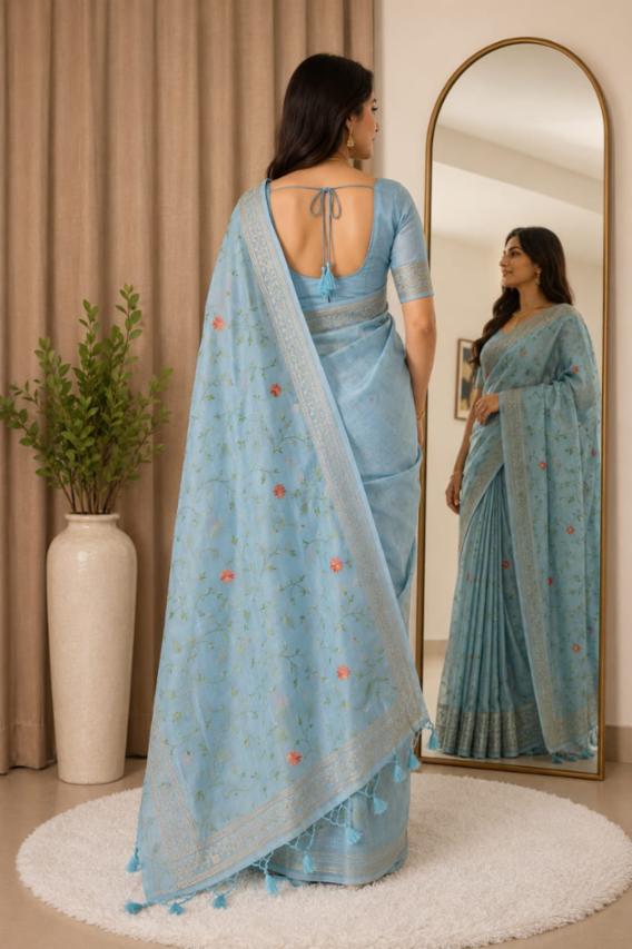 Light Blue Linen Silk Saree with Floral Embroidery and Zari Border!