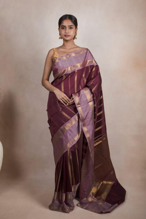 Royal Maroon Saree with Rich Golden Border.